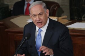 Israel Prime Minister Benjamin Netanyahu urges lawmakers to reject the Iran nuclear deal during a joint meeting of Congress in the House chamber at the U.S. Capitol, March 3, 2015.