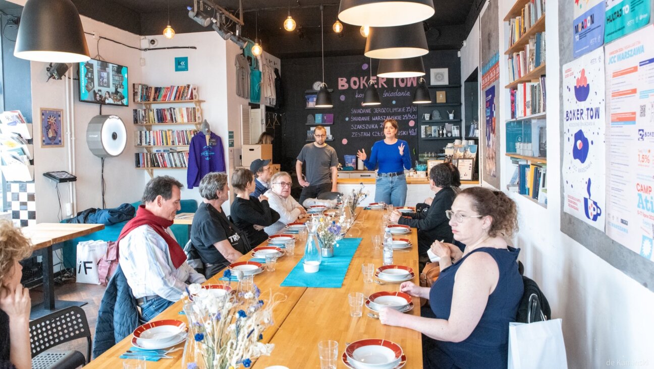 Participants in the Miszpucha Foundation trip for Polish Jewish emigrants and their descendants have lunch at the Jewish Community Center in Warsaw, Poland.