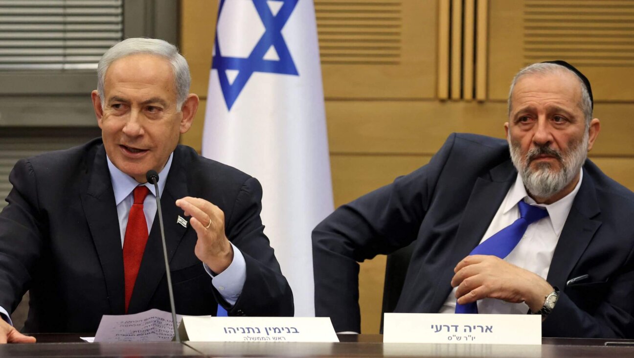 Israeli Prime Minister Benjamin Netanyahu and Aryeh Deri, chairman of the Shas party, on May 23, 2023.