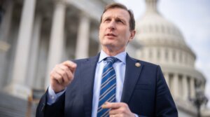 Rep. Dan Goldman talks with a reporter outside the U.S. Capitol on December 18, 2025. (Tom Williams/CQ Roll Call)