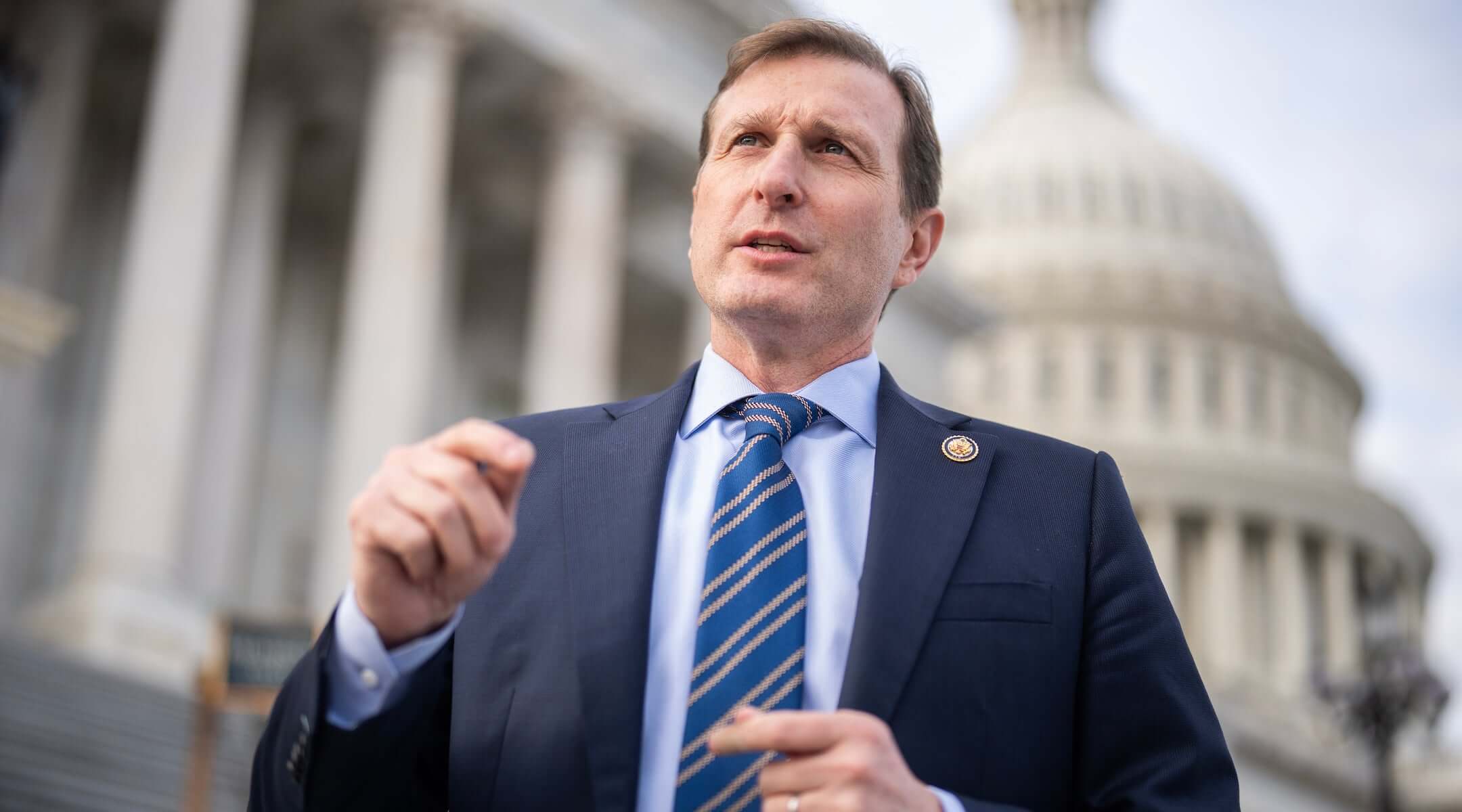 Rep. Dan Goldman talks with a reporter outside the U.S. Capitol on December 18, 2025. (Tom Williams/CQ Roll Call)