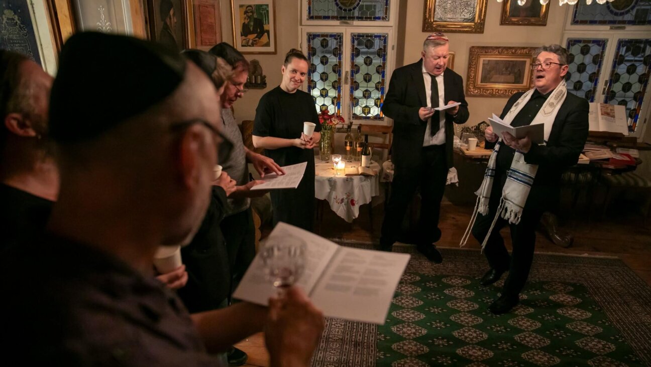 Jewish Cultural Center Ljubljana director Robert Waltl, right, at the opening 
of an exhibition on the Holocaust.