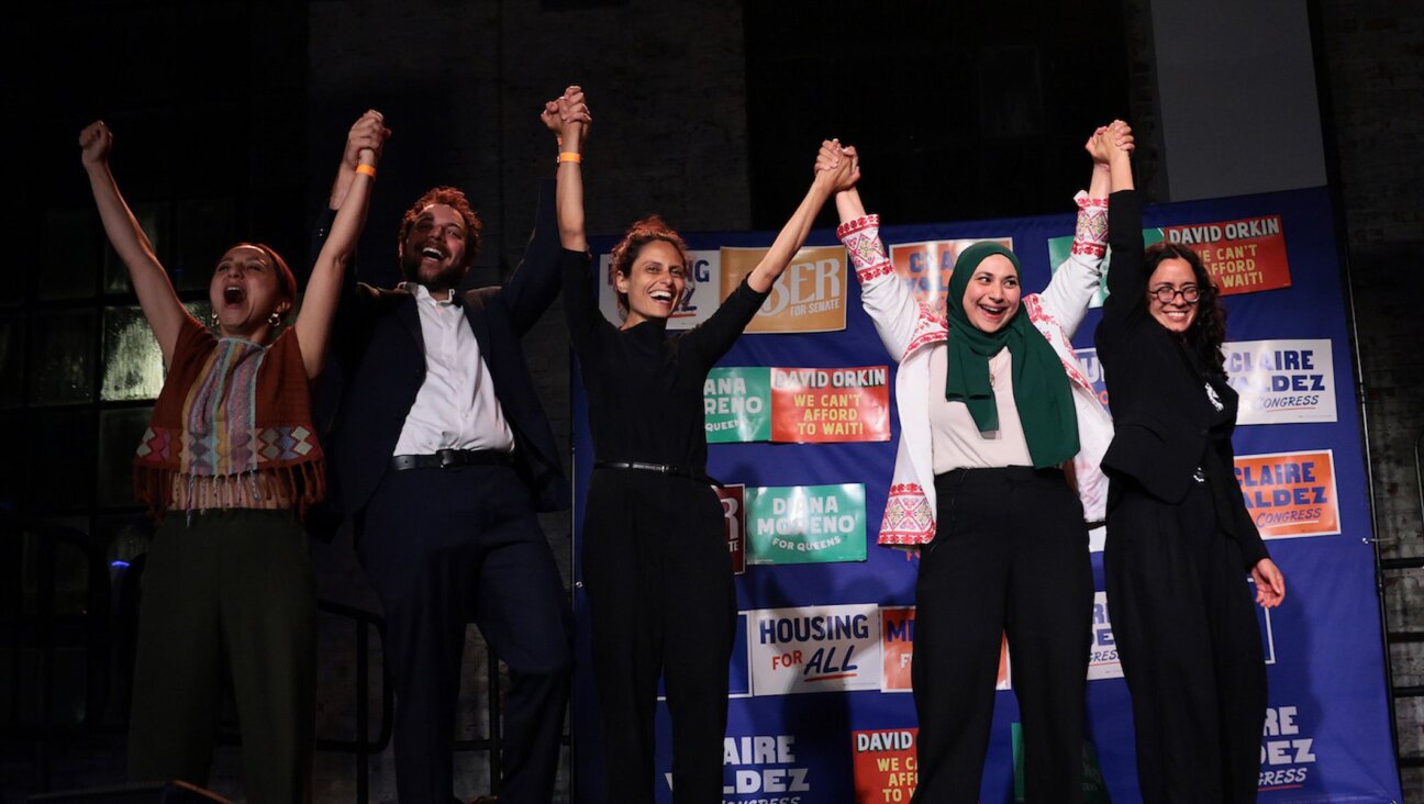David Orkin (second from left) celebrates at a primary-night watch party at 99 Scott Studio on June 23, 2026 in the East Williamsburg neighborhood of the Brooklyn borough in New York City. (Michael M. Santiago/Getty Images)