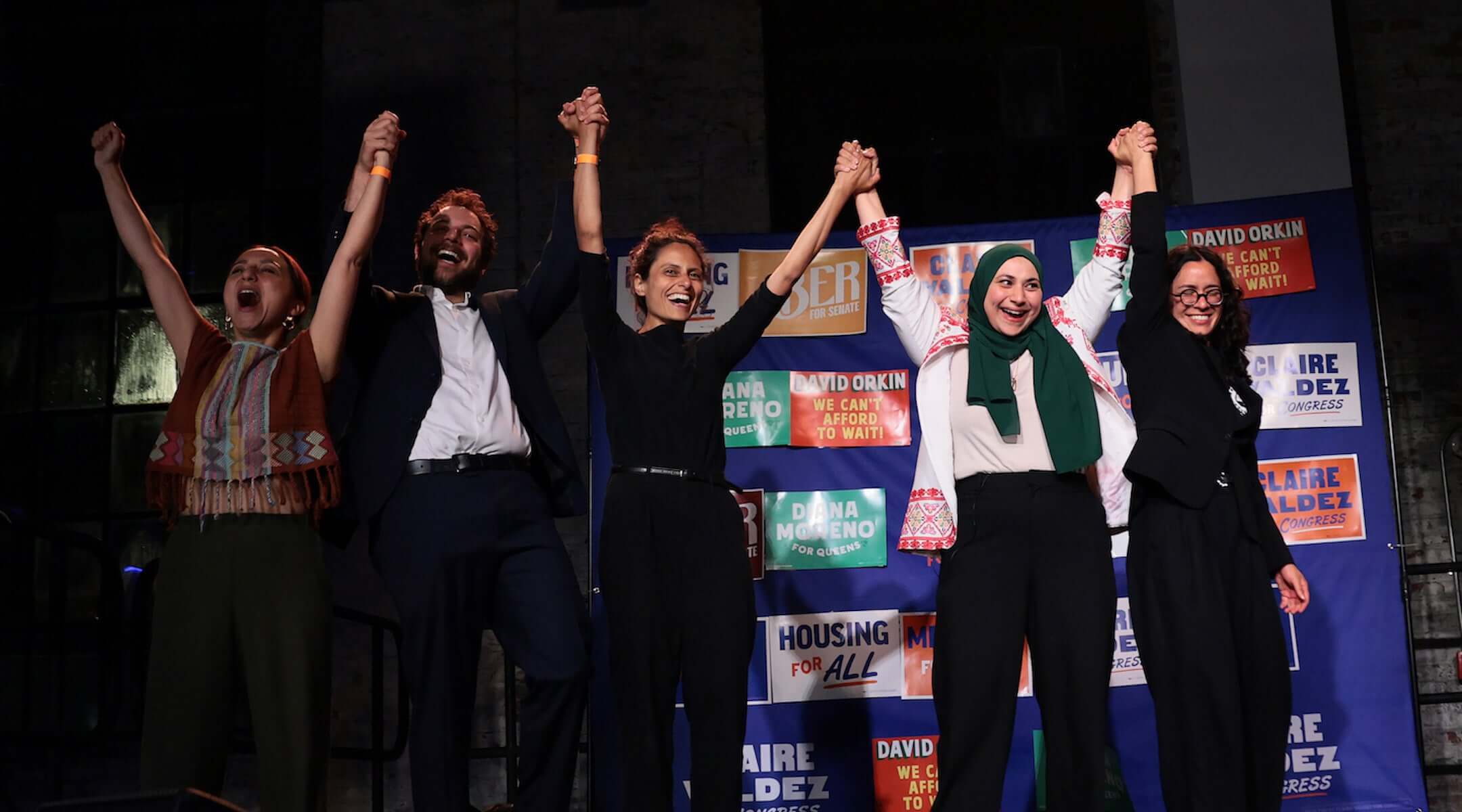 David Orkin (second from left) celebrates at a primary-night watch party at 99 Scott Studio on June 23, 2026 in the East Williamsburg neighborhood of the Brooklyn borough in New York City. (Michael M. Santiago/Getty Images)